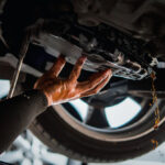 Car,Mechanic,Drain,The,Old,Automatic,Transmission,Fluid,(atf),Or